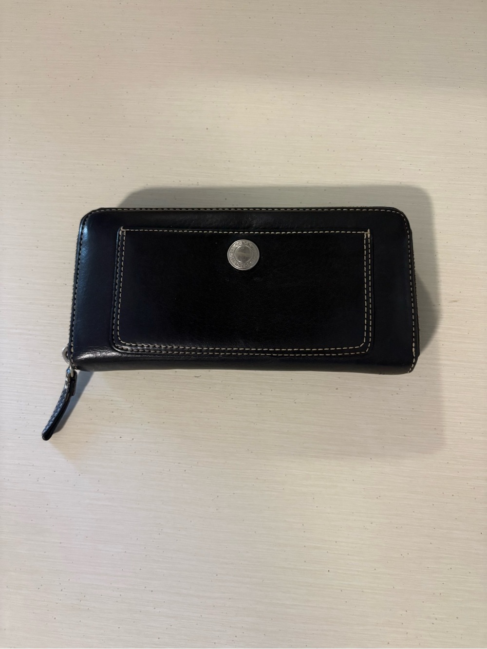 Coach Black Leather Zip-Around Wallet with Silver Emblem